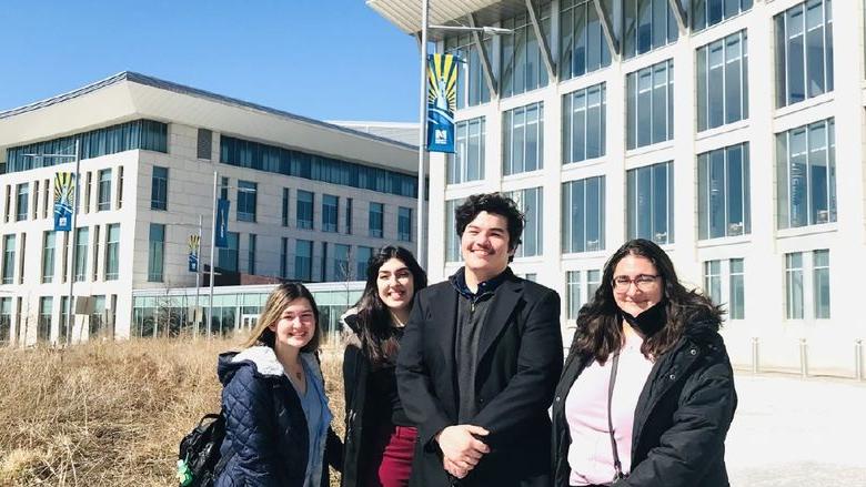 Students pose for picture at conference 